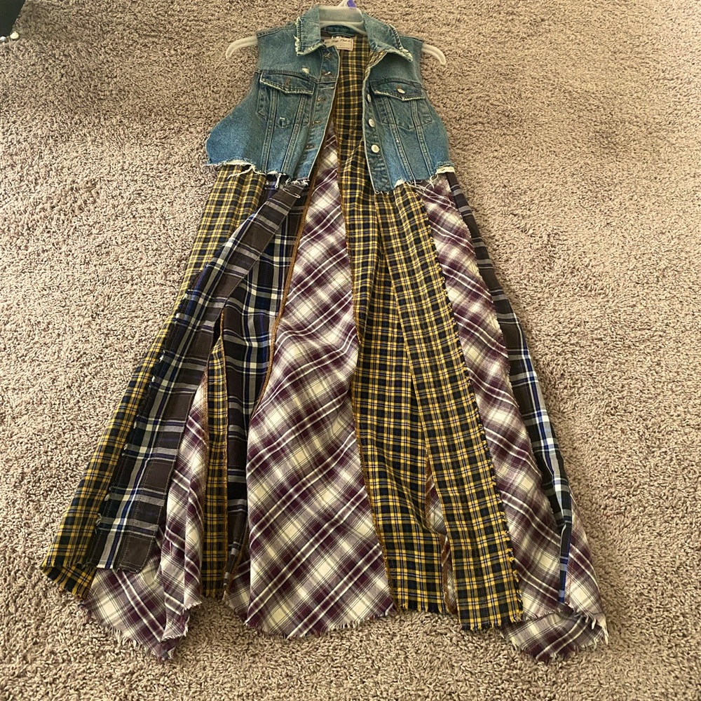 Long jean jacket vest featuring plaid patterns